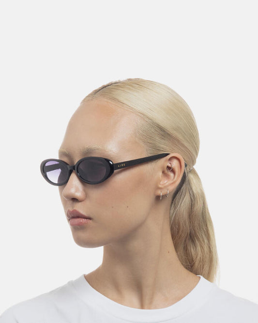 Image of Sunglasses. Productname: Aire Fornax Sunglasses: Black - Women's Sunglasses in Black colour by brand - Novo