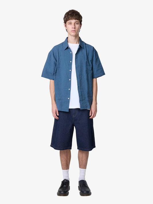 Image of a model wearing Tops. Productname: Article One Seltzer Shirt in BLUE CHECK colour by brand - Article One