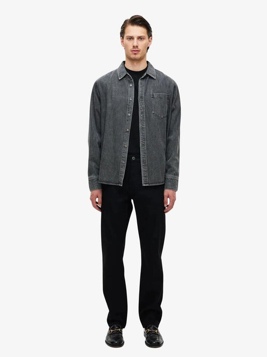 Image of a model wearing Denim. Productname: Neuw Ray Straight Jeans in Black colour by brand - Neuw