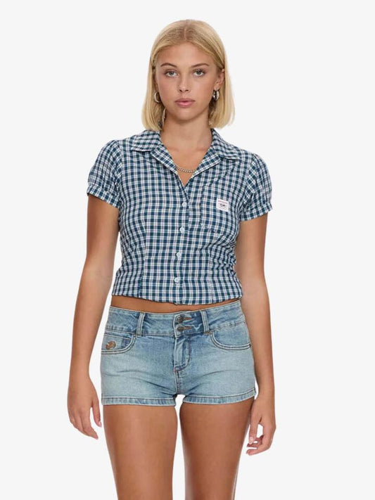 Image of a model wearing Shorts. Productname: Worship 00S Micro Short in Light N Dirty colour by brand - Worship