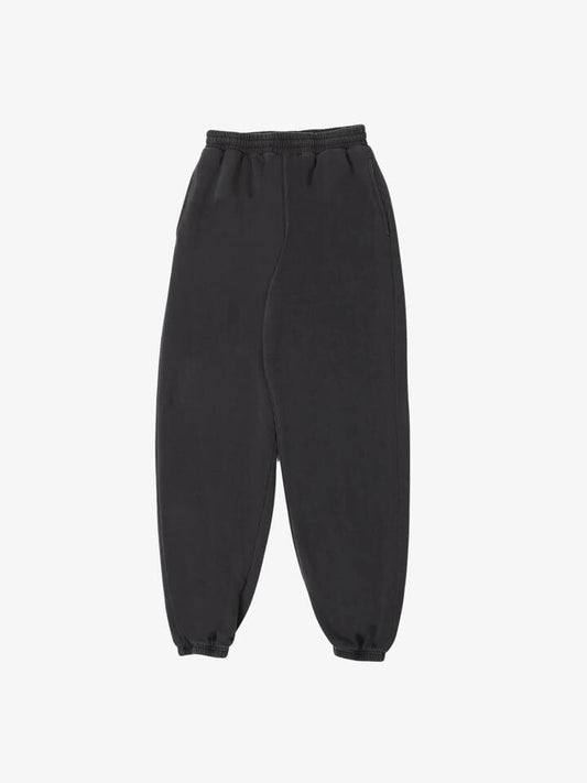 Image of a model wearing Pants. Productname: Noon Goons Pacific Sweatpants in Black colour by brand - Noon Goons