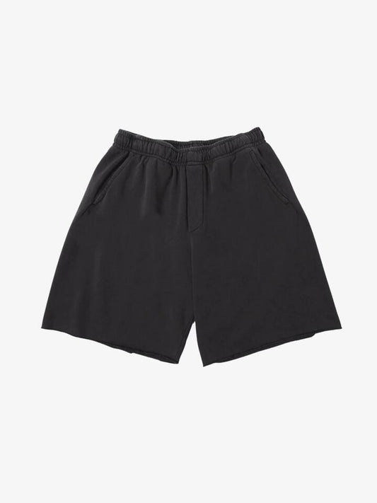Image of a model wearing Shorts. Productname: Noon Goons Pacific Sweatshorts in Black colour by brand - Noon Goons