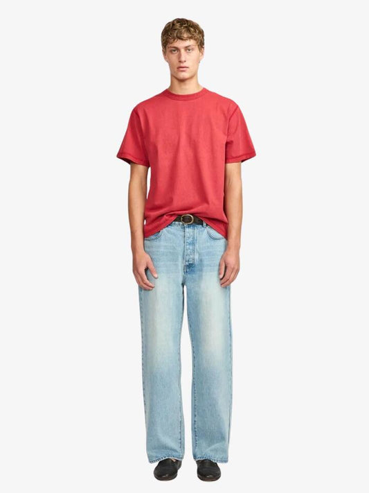 Image of a model wearing Tops. Productname: Larriet Blind Tee in Red colour by brand - Larriet