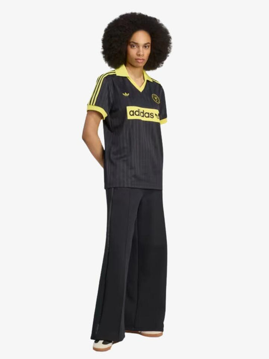 Image of a model wearing Tops. Productname: Adidas Football Tee in black colour by brand - Adidas