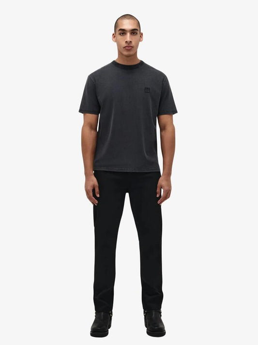 Image of a model wearing Tops. Productname: Neuw Natural High Tee in Washed Black colour by brand - Neuw