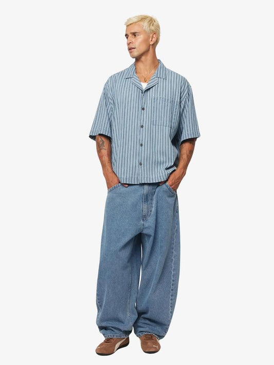 Image of a model wearing Tops. Productname: Abrand Bobby Camp Stripe Shirt in Denim Blue colour by brand - Abrand