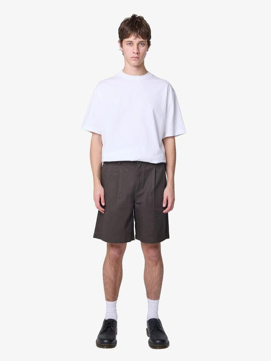 Image of a model wearing Shorts. Productname: Article One Bolton Chino Shorts in Olivewood colour by brand - Article One