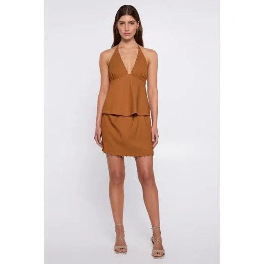 Image of a model wearing Skirts. Productname: Endless Day Mini Skirt in GINGER colour by brand - sass and bide