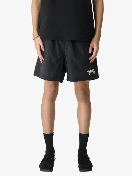 Image of a model wearing Shorts. Productname: S-Double Nylon King Coast Boxer in Black colour by brand - S-Double