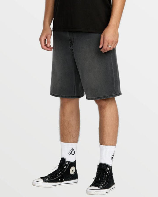 Image of a model wearing Shorts. Product name - Volcom Mens Billow 22" Denim Shorts Concrete in Concrete colour by brand - Volcom