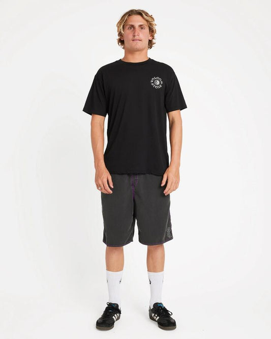 Image of a model wearing Shorts. Product name - Volcom Mens Off Ozzy Trunk 21" Swim Shorts Black in Black colour by brand - Volcom