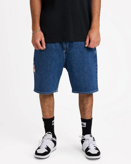 Image of a model wearing Shorts. Productname: Quiksilver - Mens Legacy Denim Shorts - Denim - in Denim colour by brand - Quiksilver