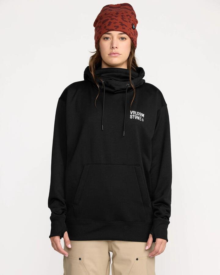 Image of a model wearing Outerwear. Product name - Volcom Womens Riding Hydro Pullover Hoodie Black in Black colour by brand - Volcom