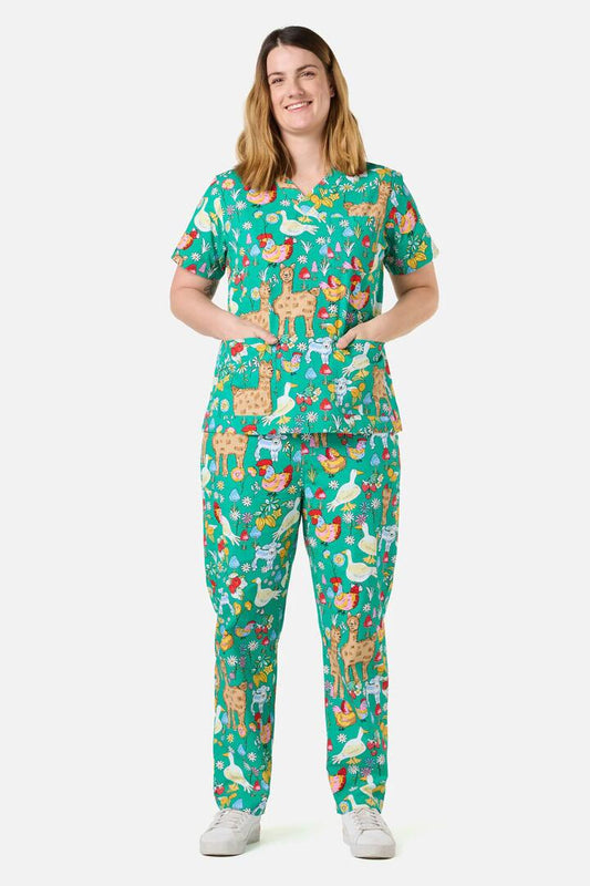 Image of a model wearing Uniforms & Workwear. Productname: Farm Animals Scrub Set in Green colour by brand - Scrubs With Love