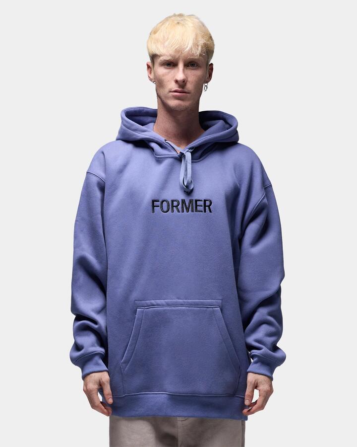 Image of a model wearing Outerwear. Product name - Former Mens Legacy Embroidery Pullover Hoodie Violet in Violet colour by brand - Former