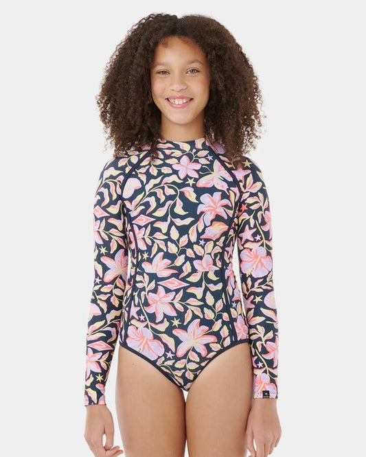 Image of a model wearing Tops. Product name - Rip Curl Girls 8-16 Sunset Skies Long Sleeve One Piece Navy in Navy colour by brand - Rip Curl