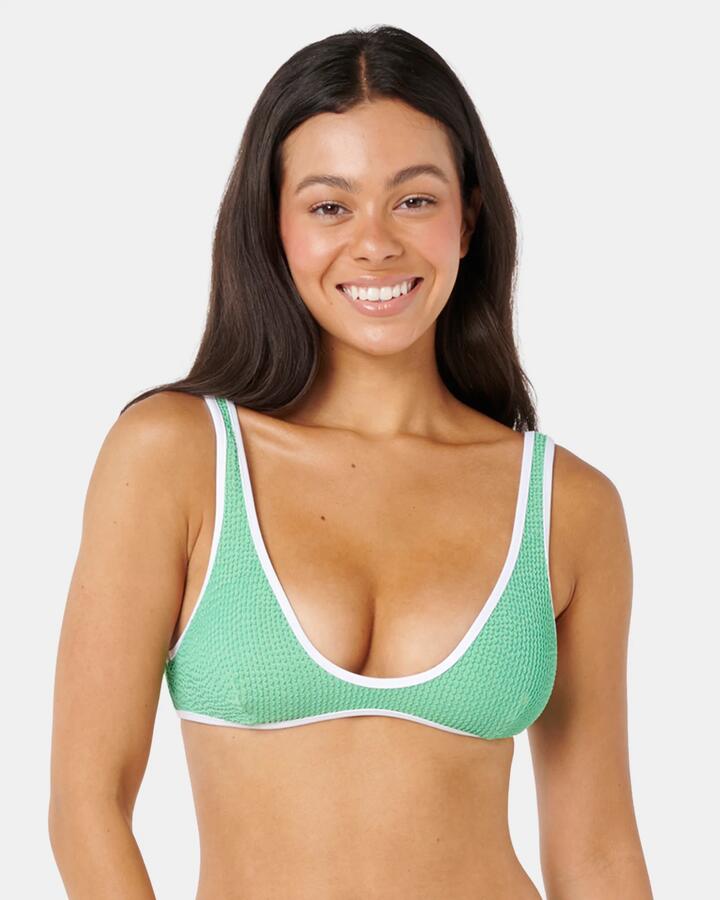 Image of a model wearing Tops. Product name - Rip Curl Womens Luxe Surf Bralette Bikini Top Irish Green Solid in Irish Green - Solid colour by brand - Rip Curl