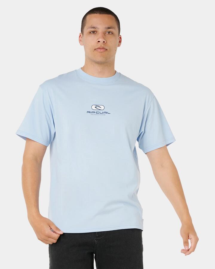 Image of a model wearing Tops. Productname: rip Curl Mens Pill Icon T-Shirt Blue - in Blue colour by brand - rip Curl