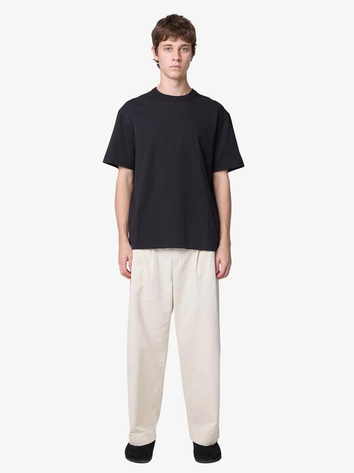 Image of a model wearing Pants. Productname: Article One Nano Pants in Bone colour by brand - Article One