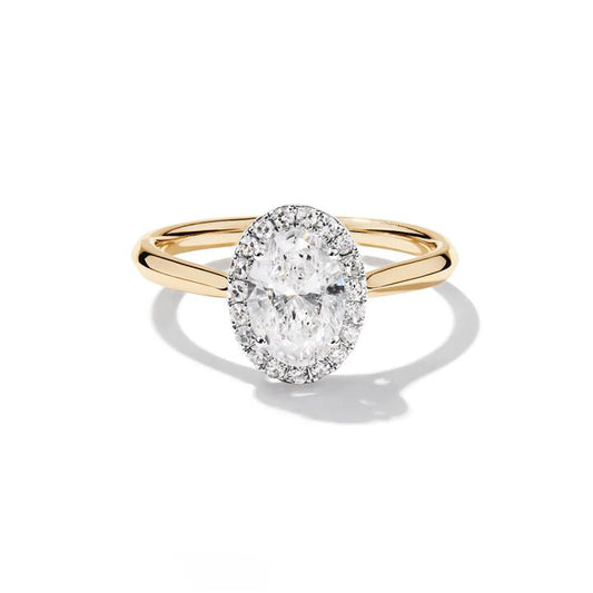 Image of Jewelry. Productname: Oval Halo Ring with 1.10tw of Laboratory-Grown Diamonds in 9kt Yellow Gold in Diamond colour by brand - Bevilles