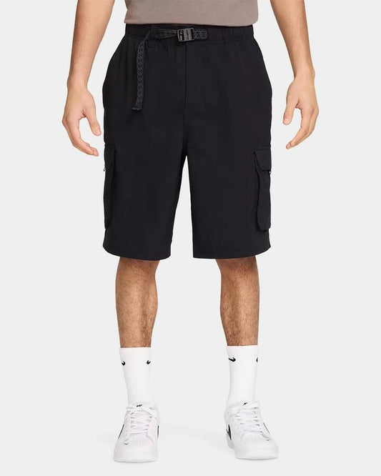 Image of a model wearing Shorts. Productname: nike Mens Sb Dri-Fit Kearny Cargo Shorts Black/White - in Black/White colour by brand - Nike