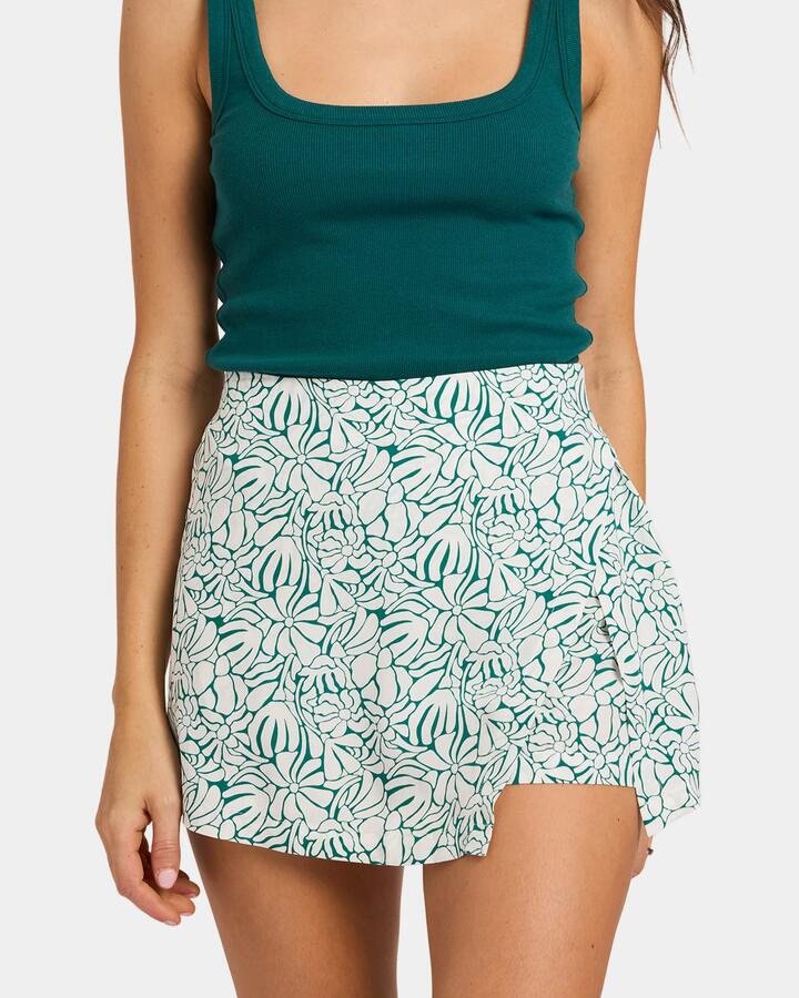 Image of a model wearing Skirts. Product name - Nunui Womens Verity Skort Green in Green colour by brand - Nunui