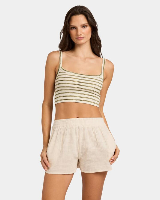 Image of a model wearing Tops. Productname: Nunui Womens Traverse Stripe Crop Tank Stripe - in Stripe colour by brand - Nunui