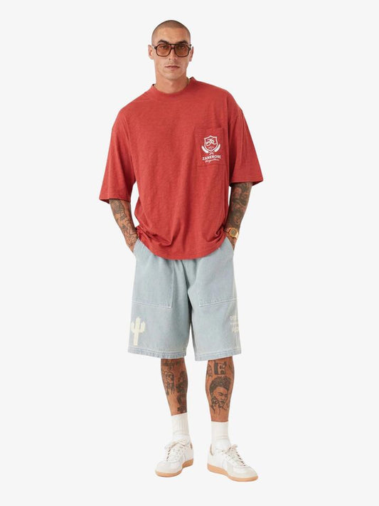 Image of a model wearing Tops. Productname: Zanerobe Crest Slub Flow Tee in Cherry colour by brand - Zanerobe