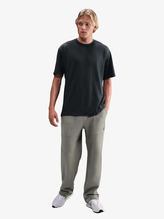 Image of a model wearing Tops. Productname: Nike Nike Sportswear Oc Collar Print T-Shirt in Anthracite colour by brand - Nike