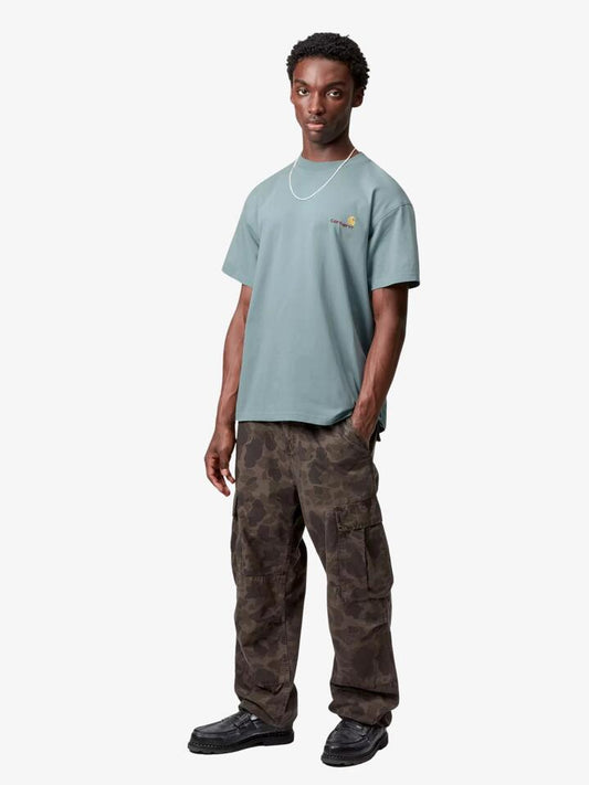 Image of a model wearing Shorts. Productname: Carhartt Wip Short Sleeve American Script T-Shirt in Citadel colour by brand - Carhartt Wip