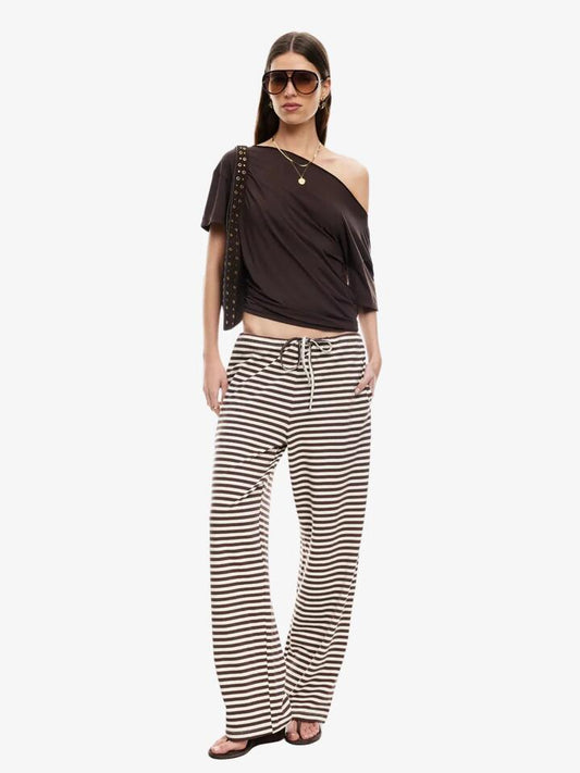 Image of a model wearing Tops. Productname: Lioness Wildlands Tee in Chocolate colour by brand - Lioness