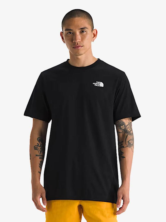 Image of a model wearing Tops. Productname: The North Face Men's Evolution Pack Short Sleeve Tee in Tnf Black colour by brand - The North Face