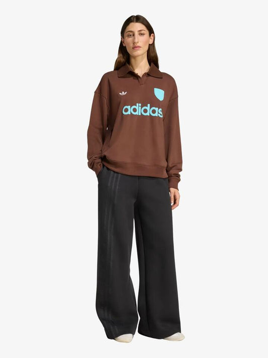 Image of a model wearing Outerwear. Productname: Adidas Graphic Soccer Sweatshirt in Auburn colour by brand - Adidas