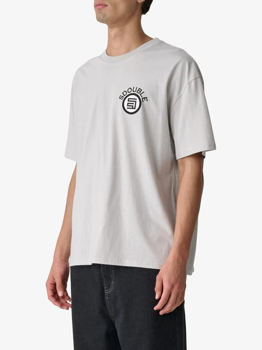 Image of a model wearing Tops. Productname: S-Double Arch Dot Short Sleeve Tee in Light Blue colour by brand - S-Double