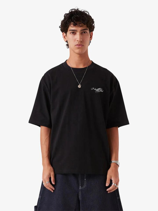 Image of a model wearing Tops. Productname: Barney Cools Plc Crop Tee in Black colour by brand - Barney Cools