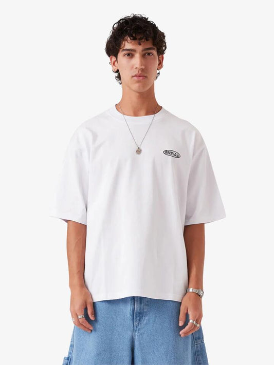 Image of a model wearing Tops. Productname: Barney Cools Radio Crop Tee in White colour by brand - Barney Cools