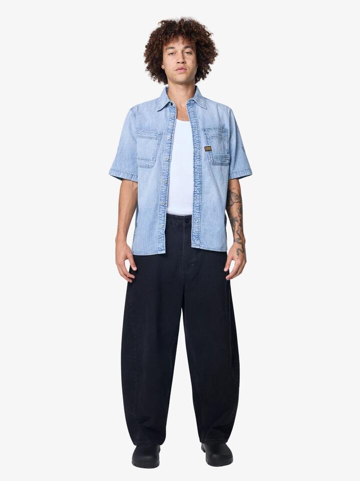 Image of a model wearing Tops. Productname: G-Star Slanted Double Pocket Shirt in Sun Faded Blue Mist colour by brand - G-Star