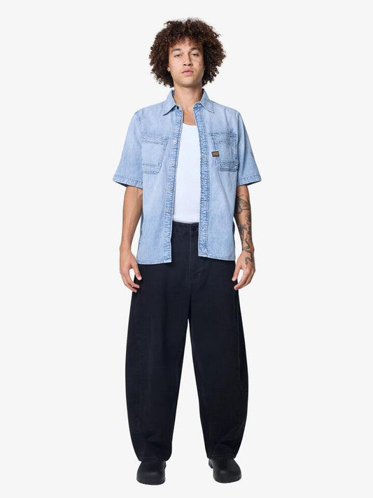 Image of a model wearing Tops. Productname: G-Star Slanted Double Pocket Shirt in Sun Faded Blue Mist colour by brand - G-Star