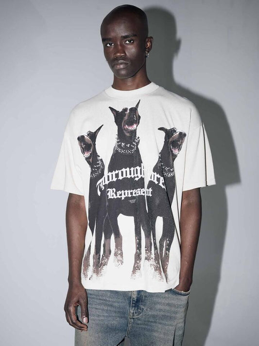 Image of a model wearing Tops. Productname: Represent Represent Thoroughbred T-Shirt in Vintage White colour by brand - Represent