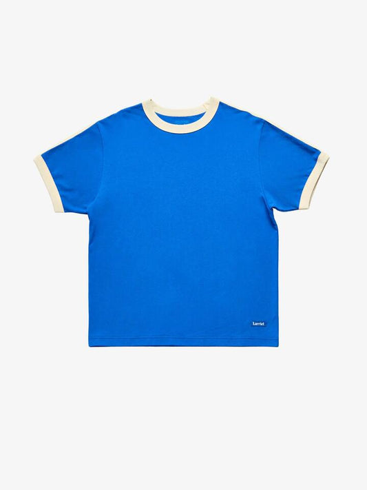 Image of a model wearing Tops. Productname: Larriet Penny Tee in Larriet Blue colour by brand - Larriet