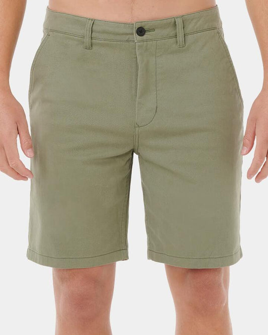 Image of a model wearing Shorts. Productname: rip Curl Mens Classic Surf Chino Shorts Cactus - in Cactus colour by brand - rip Curl