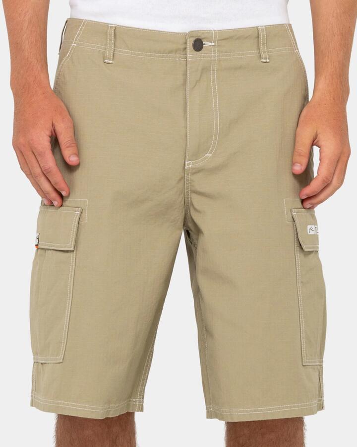 Image of a model wearing Shorts. Productname: rusty Mens Commando Rippa Cargo Shorts Putty - in Putty colour by brand - Rusty