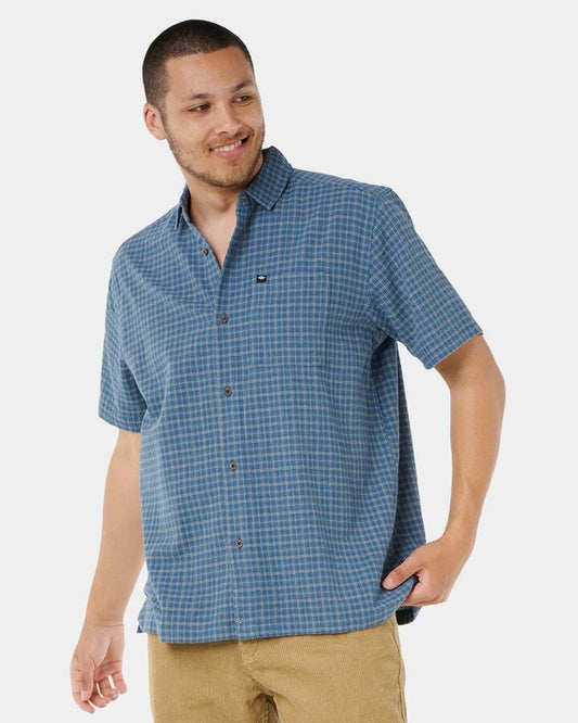 Image of a model wearing Tops. Productname: rip Curl Mens Classic Surf Check Short Sleeve Shirt Bluefin - in Bluefin colour by brand - rip Curl