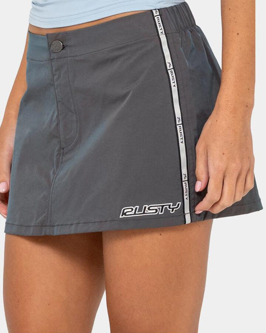 Image of a model wearing Skirts. Productname: rusty - Womens Lombardi Mini Skirt - Olive - in Olive colour by brand - rusty