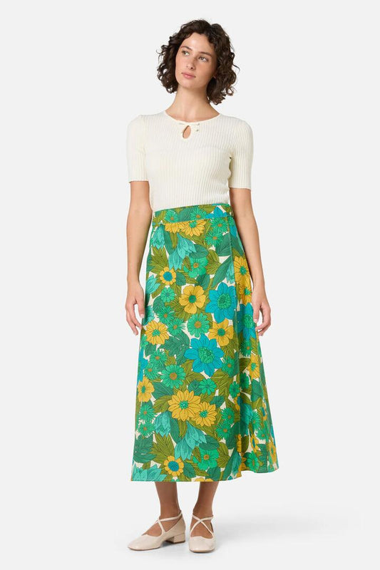 Image of a model wearing Skirts. Productname: Nellie 70'S Floral Wrap Skirt in Green colour by brand - Princess Highway