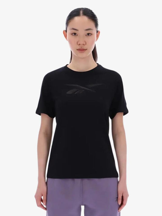 Image of a model wearing Tops. Productname: Reebok Audrey Tonal Logo Crew Neck Ss Tee in Black colour by brand - Reebok