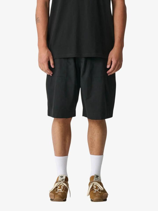 Image of a model wearing Shorts. Productname: Xlarge Living Xl Shorts in Black colour by brand - Xlarge