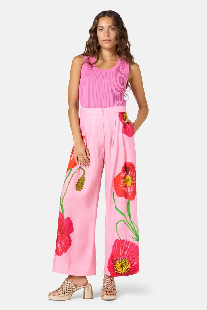 Image of a model wearing Pants. Product name - Poppies Print Linen Pants in Print colour by brand - Gorman