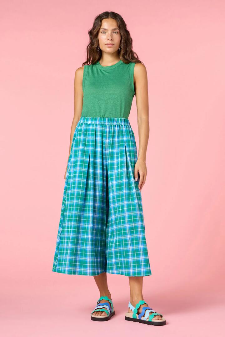 Image of a model wearing Skirts. Product name - Plaid Play Check Skort in Check colour by brand - Gorman