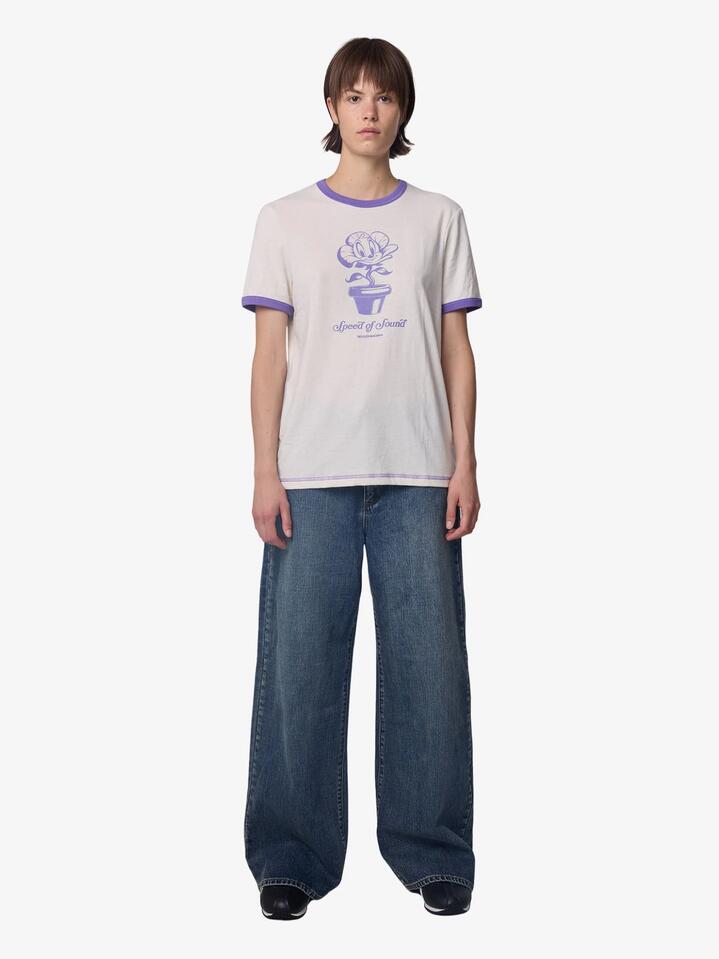 Image of a model wearing Tops. Productname: Deus Green Thumb Ringer Tee in Dirty White/Lilac colour by brand - Deus